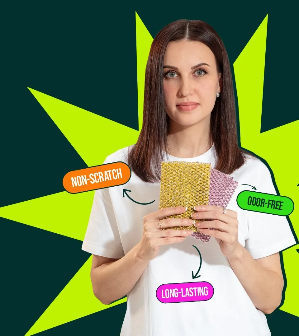 Woman holding golden and pink non-scratch scrubbers, labelled non-scratch, odor-free and long-lasting
