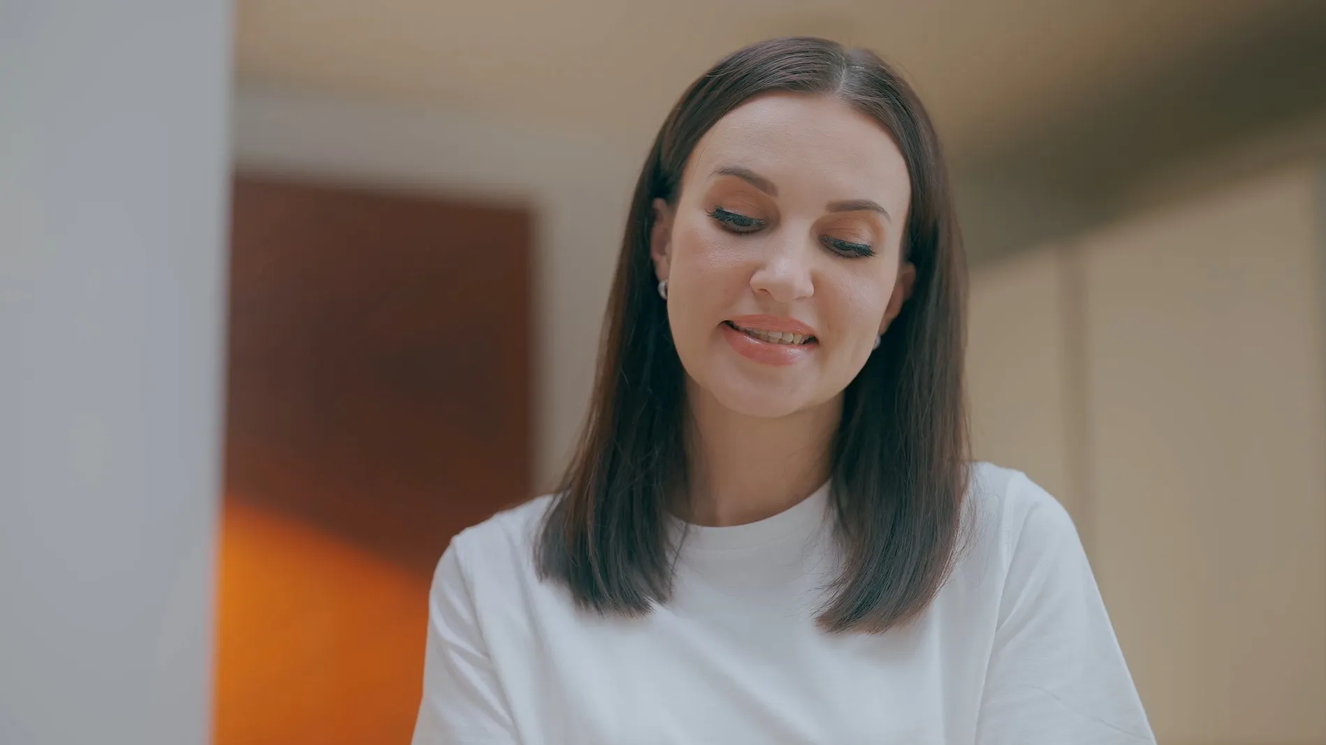 Smiling woman in her kitchen